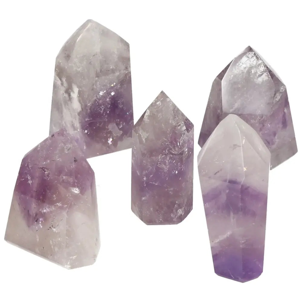 Polished Point Amethyst S gemstones in various sizes, ideal for stress relief and energy boost, from Sylvia Crystals.