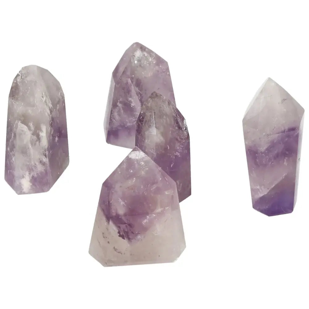 Group of polished point amethyst crystals from Sylvia Crystals, ideal for stress relief and emotional stability.