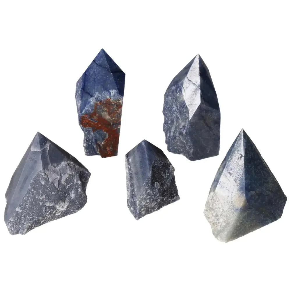 Collection of polished point blue quartz crystals promoting tranquility and clarity, ideal for spiritual wellness and emotional balance.