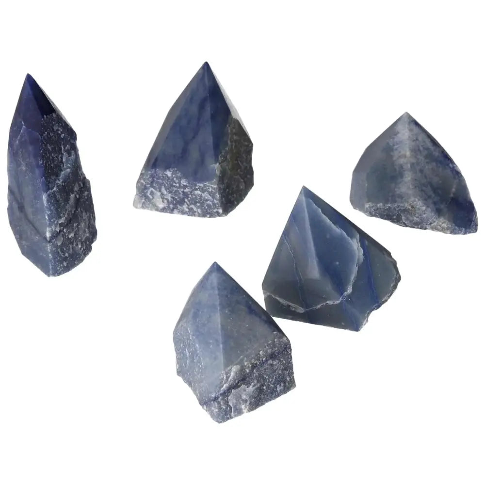 Collection of polished blue quartz points enhancing clarity and emotional balance.