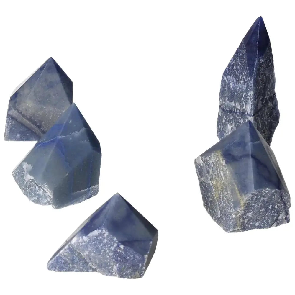 Cluster of polished blue quartz points promoting clarity, peace, and emotional balance from Sylvia Crystals collection.