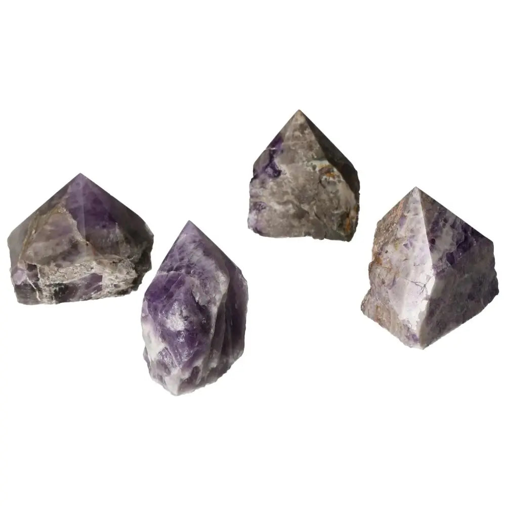 Polished Point Chevron Amethyst gemstones showcasing stunning crystal beauty and metaphysical properties for stress relief and concentration.