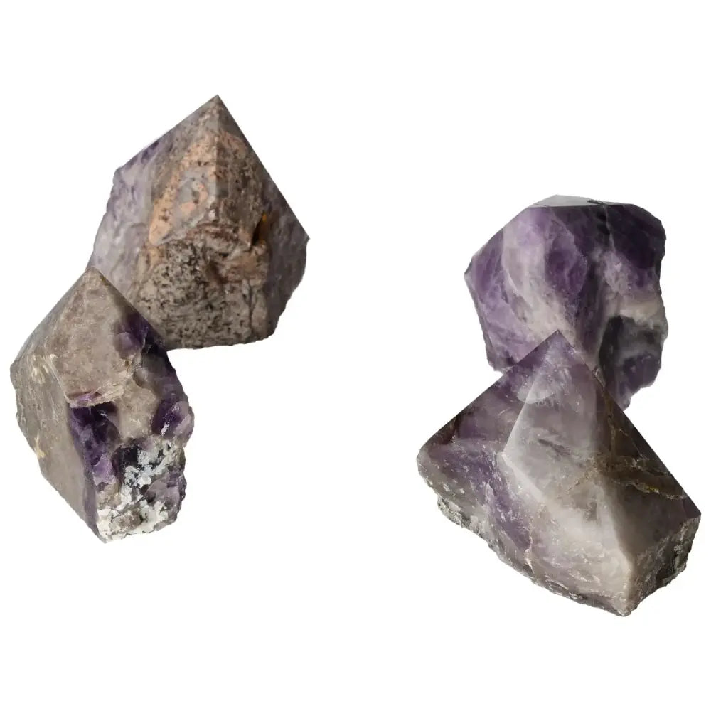 Cluster of polished Chevron Amethyst crystals showcasing vibrant purple hues and intricate patterns, perfect for enhancing concentration and reducing stress.
