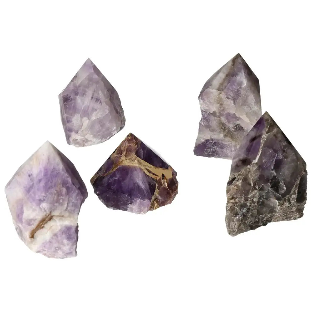 Polished Point Chevron Amethyst M gemstones with distinctive chevron patterns, sourced from Sylvia Crystals for balance and tranquility.