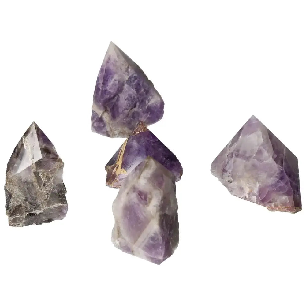 Polished Point Chevron Amethyst crystals showcasing natural chevron patterns, available from Sylvia Crystals for balance and tranquility.