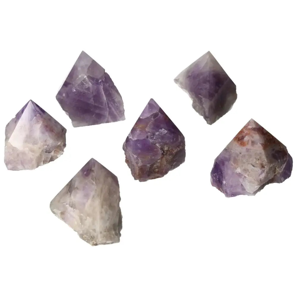 Polished Point Chevron Amethyst S from Sylvia Crystals showcasing unique patterns and vibrant purple hues, ideal for collectors.