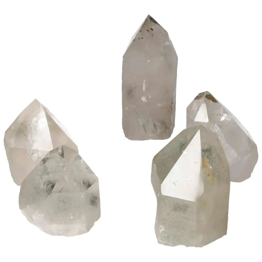 Elegant polished clear quartz crystals with chlorite, showcasing their unique formations and premium quality from Sylvia Crystals.