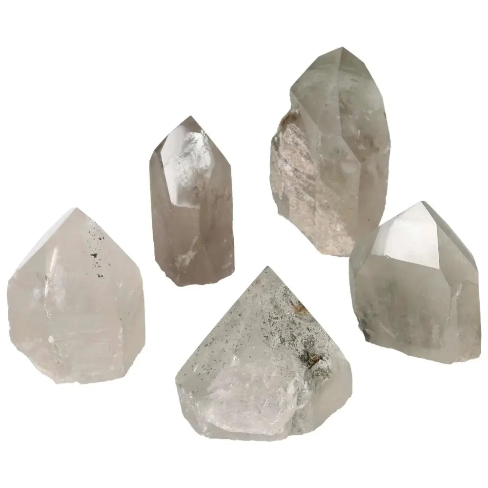 Polished Point Clear Quartz with Chlorite M stones, showcasing their spiritual luxury and purification properties by Sylvia Crystals.