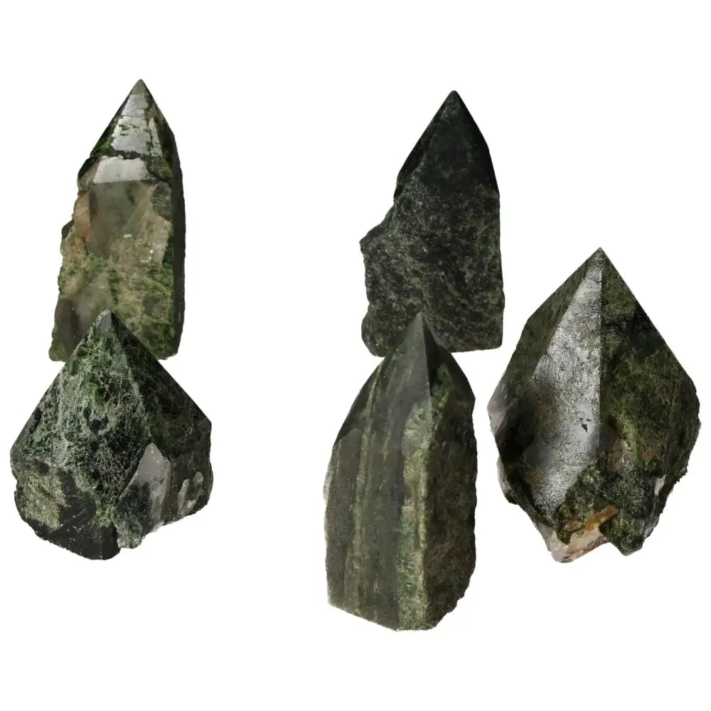 Collection of polished Point Diopside L crystals with rich green hues, known for their vibrant energy, from Sylvia Crystals.