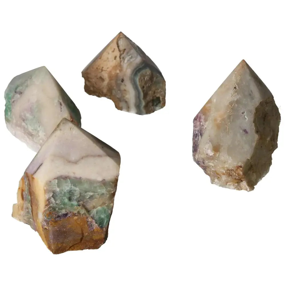 Polished Point Fluorite L gemstones from Sylvia Crystals display vibrant hues, enhancing mental faculties and personal growth.