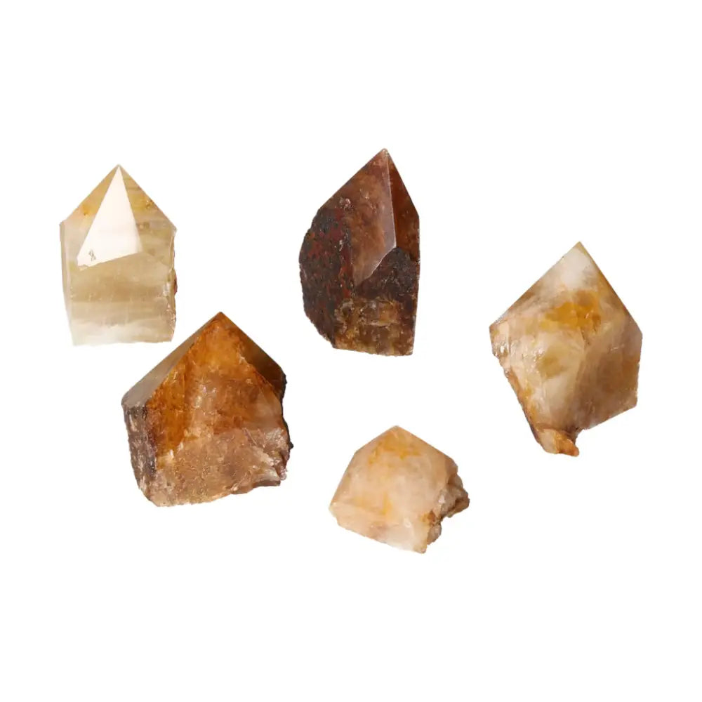Polished Hematoide crystals, elegantly shaped with vibrant natural hues, enhancing spiritual spaces with unique energy.