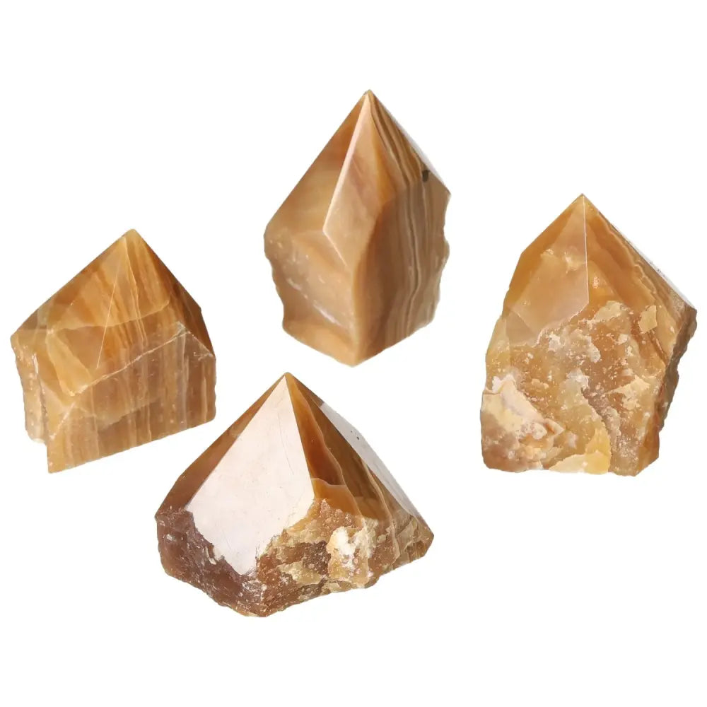 Polished Point Honey Calcite M crystals showcasing golden hues, ideal for attracting prosperity and success.