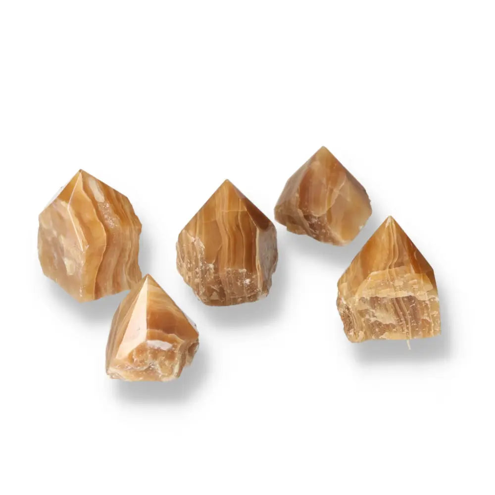 Polished Honey Calcite stones symbolizing abundance, prosperity, and success, ideal for enhancing positive energy and well-being.