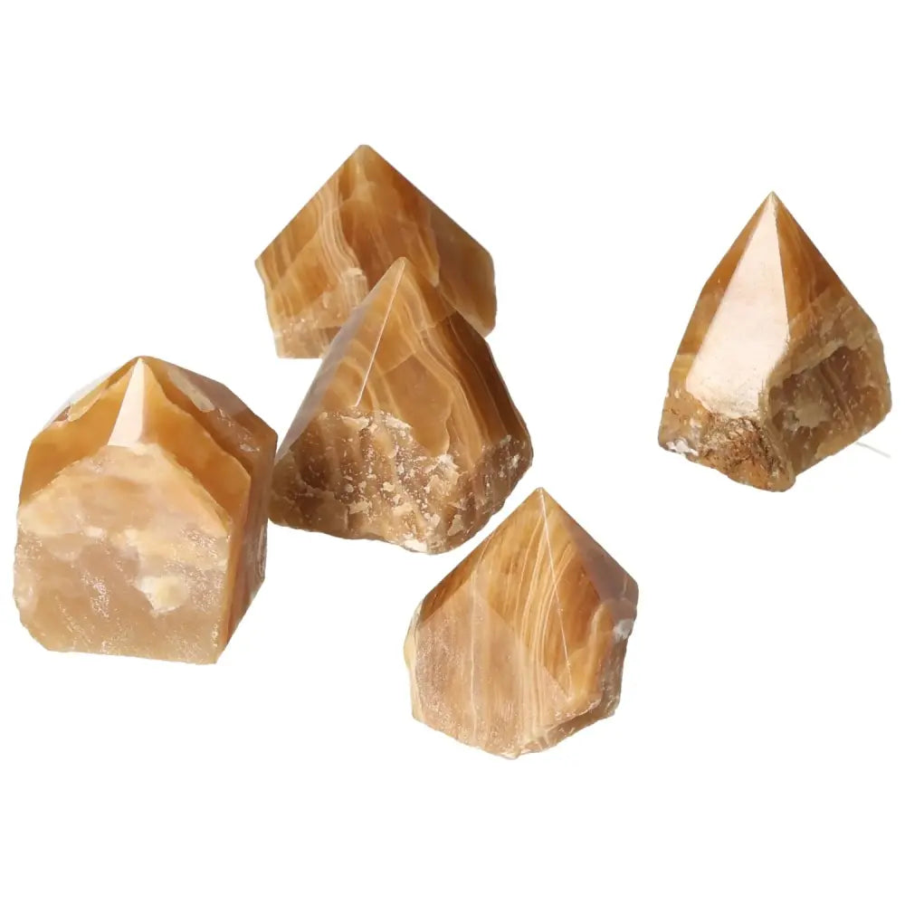 Polished Point Honey Calcite S crystals showcasing warm hues, symbolizing prosperity and abundance.