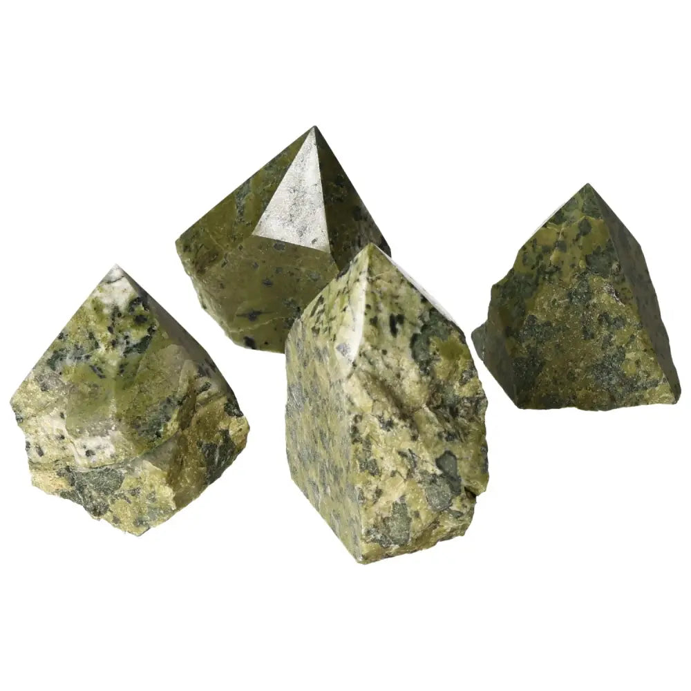 Polished Point Jadeite M gemstones from Sylvia Crystals showcasing luxurious elegance and cultural significance.