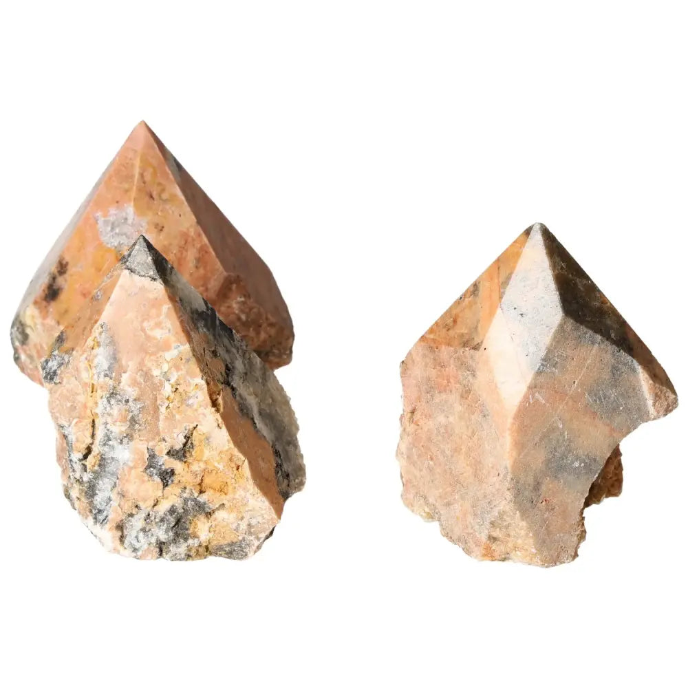 Polished Point Orquidea Calcite L crystals from Sylvia Crystals, showcasing premium craftsmanship and elegant design.