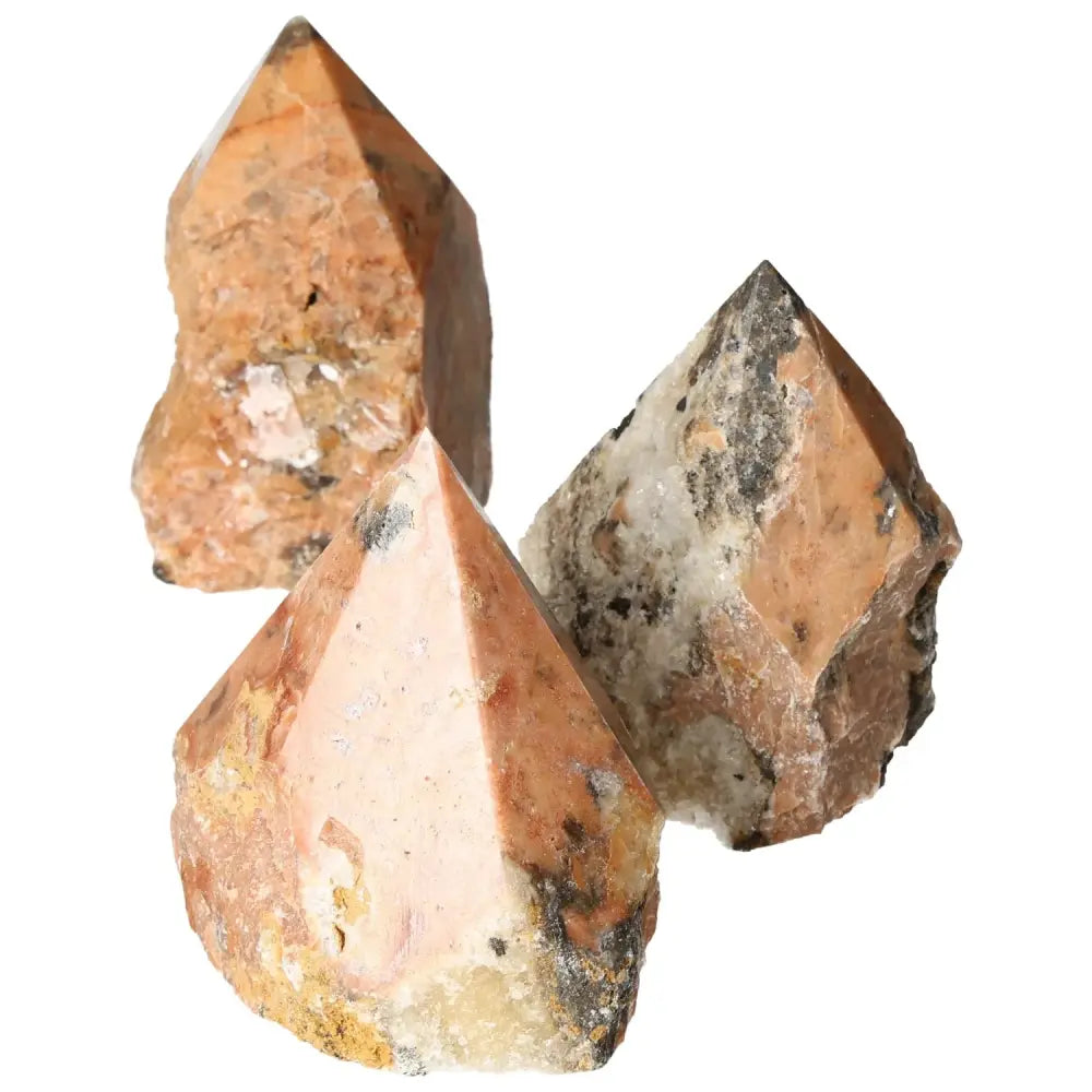 Polished Point Orquidea Calcite L gemstones from Sylvia Crystals, showcasing intricate natural patterns and premium craftsmanship.