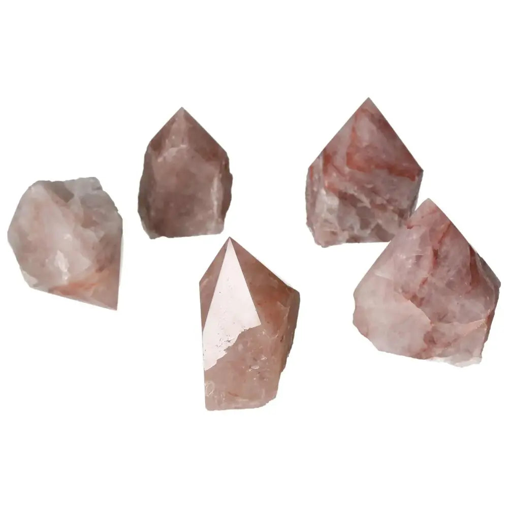Polished Point Pink Hematoide S crystals, showcasing radiant pink tones and a polished finish, perfect for luxury and spiritual wellness.