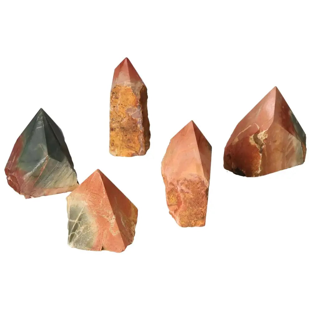 Collection of polished point polychrome jasper stones in vibrant red, orange, brown, green, and yellow hues by Sylvia Crystals.