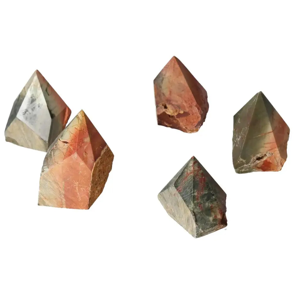 Polished Polychrome Jasper points in reds, oranges, browns, showcasing natural beauty and spiritual enrichment from Sylvia Crystals.