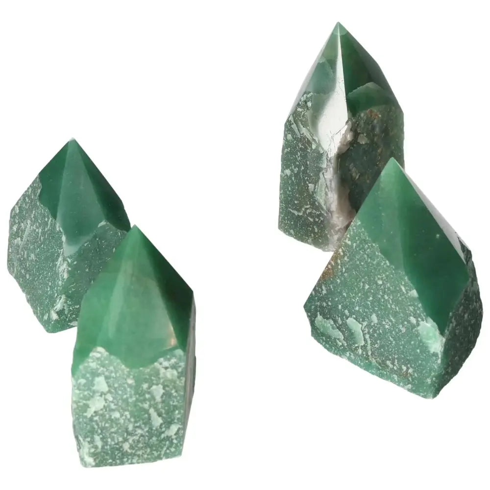 Polished Point Quartz L by Sylvia Crystals showcasing clear green quartz with elegant pointed edges, symbolizing luxury and spirituality.