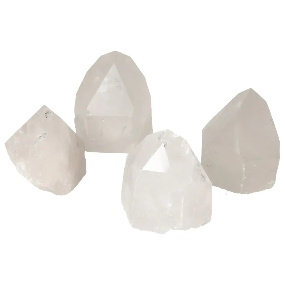Group of polished point quartz crystals by Sylvia Crystals for spiritual enhancement and chakra alignment.