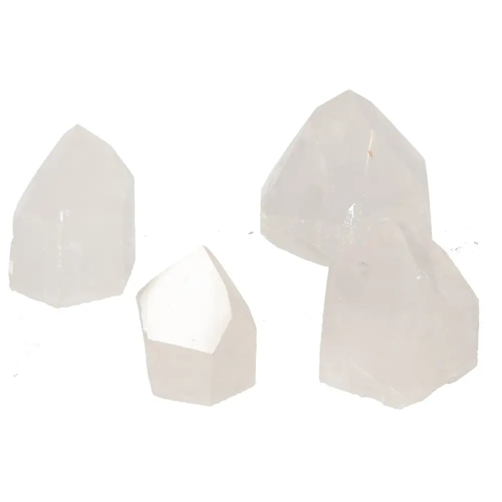 Polished Point Quartz S from Sylvia Crystals, elegantly designed to enhance energy and beauty in living spaces.