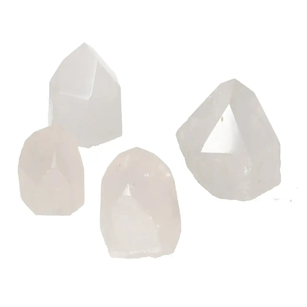 Polished Point Quartz S from Sylvia Crystals, elegant luxury crystal enhancing space with beauty and energy.