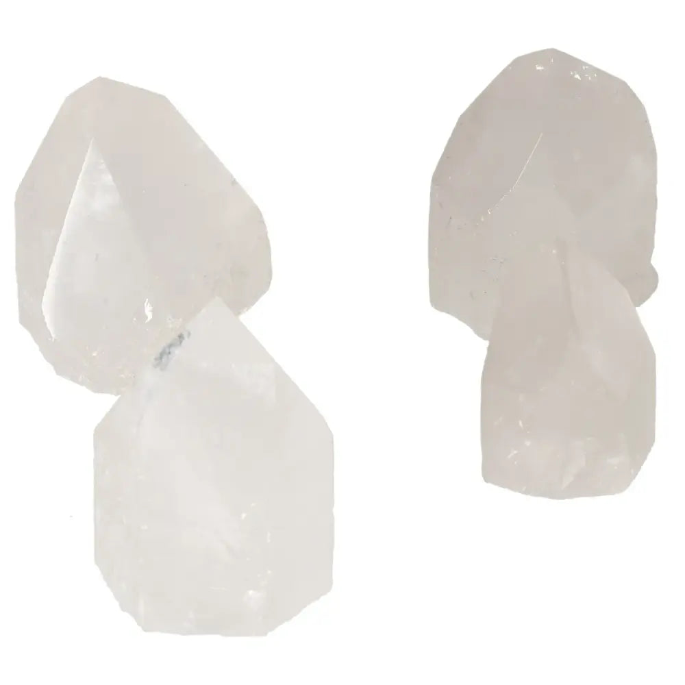 Set of polished quartz point crystals with a refined, translucent finish, perfect for enhancing energy and luxury in any space.