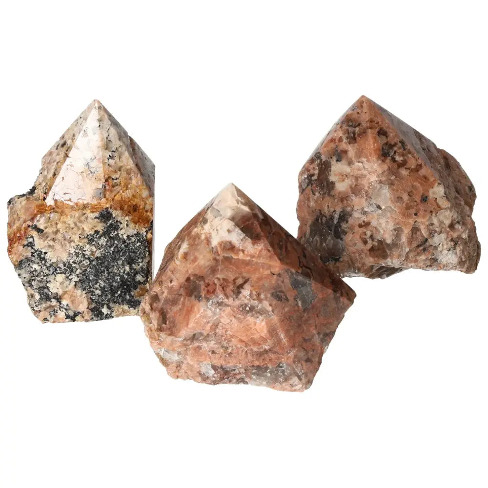 Polished Point Quartz with Feldspar L, showcasing a luxurious blend of natural beauty and brilliance, from Sylvia Crystals.