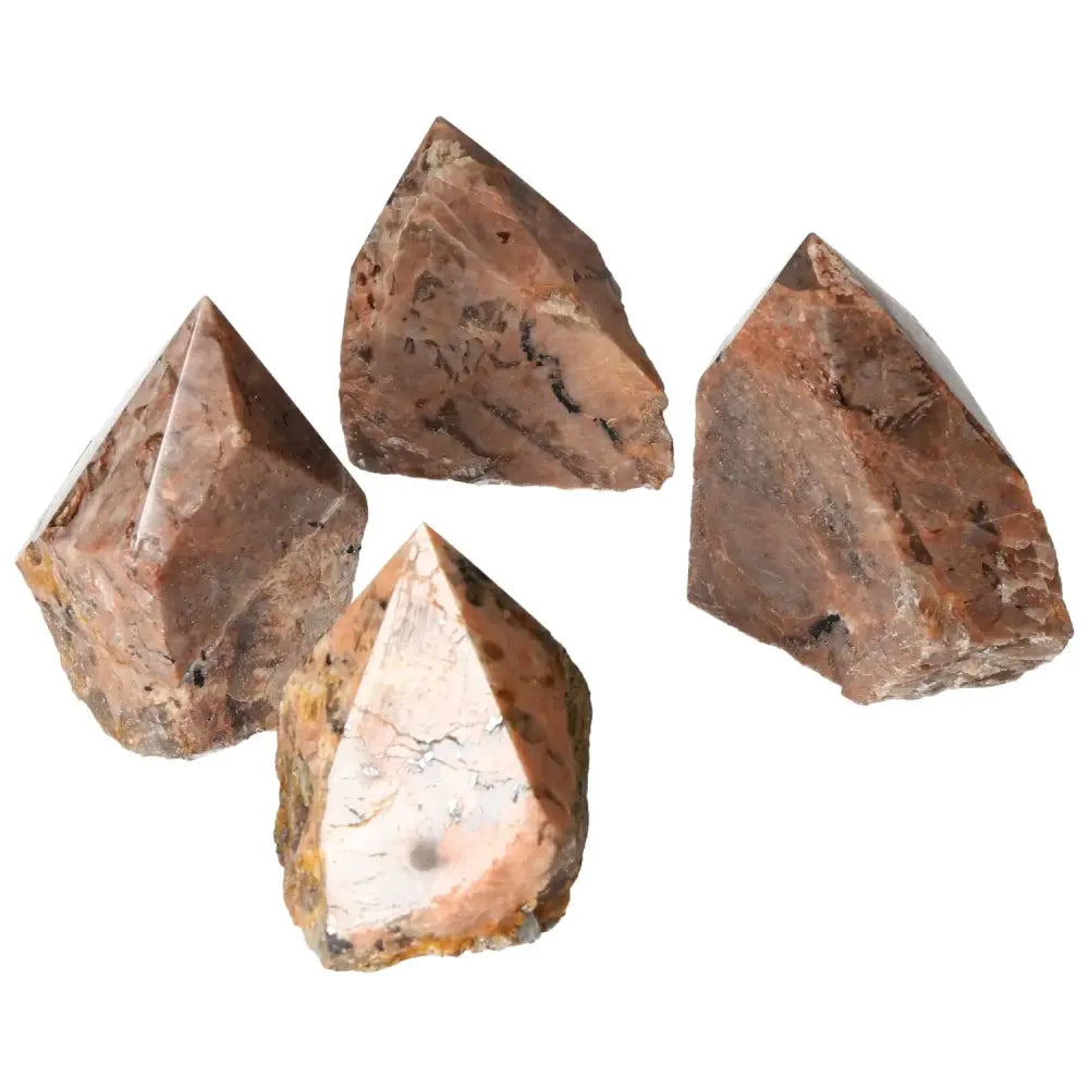 Polished Point Quartz with Feldspar M collection, showcasing rich textures and colors, offering clarity and emotional balance.