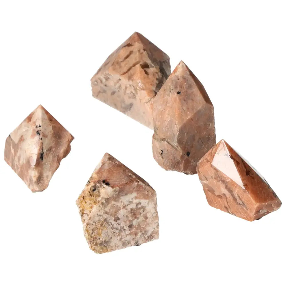 Polished Point Quartz with Feldspar S by Sylvia Crystals, enhancing creativity and balance with its exquisite beauty.