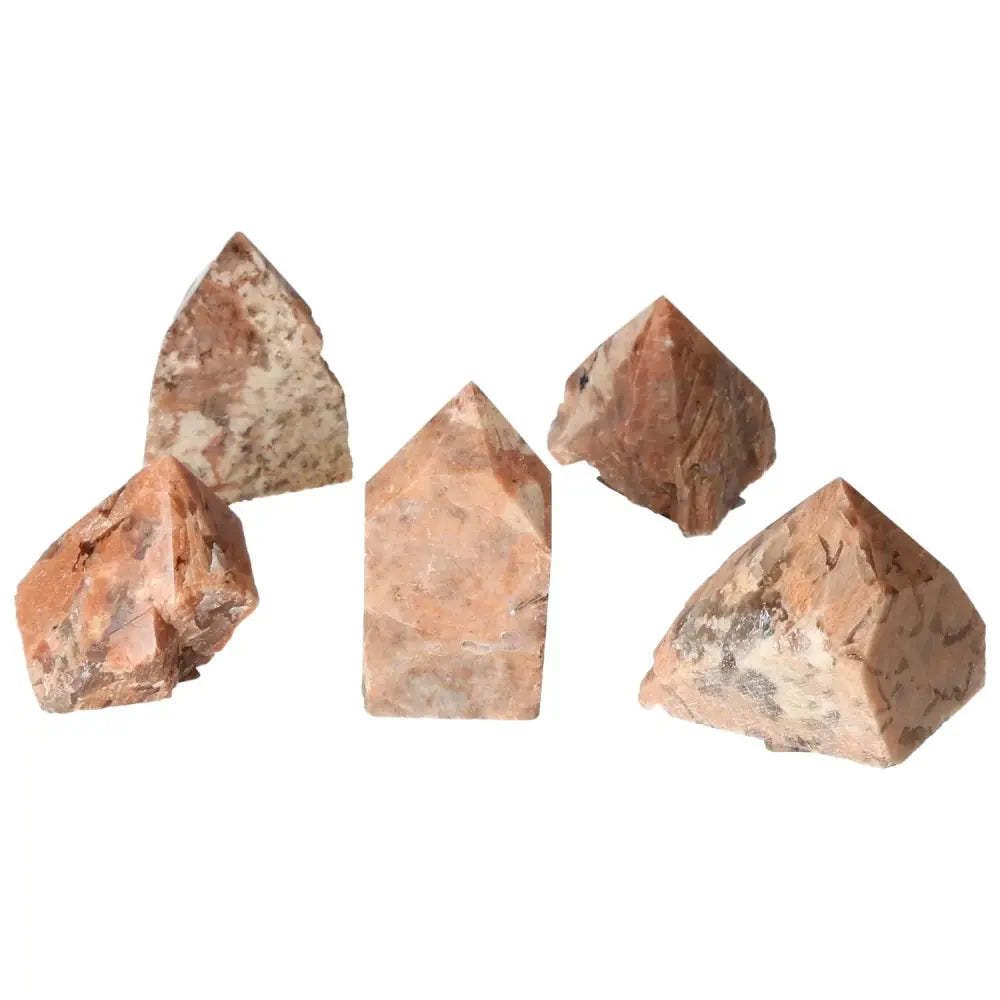 Polished Point Quartz with Feldspar stones from Sylvia Crystals, showcasing natural beauty and enhancing creativity and balance.