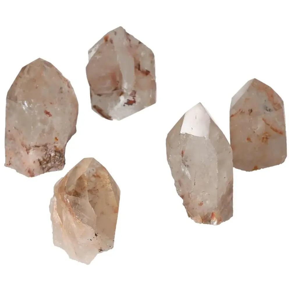 Polished Point Quartz with Hematite by Sylvia Crystals showcasing raw elegance and metaphysical power, perfect for home and personal strength.