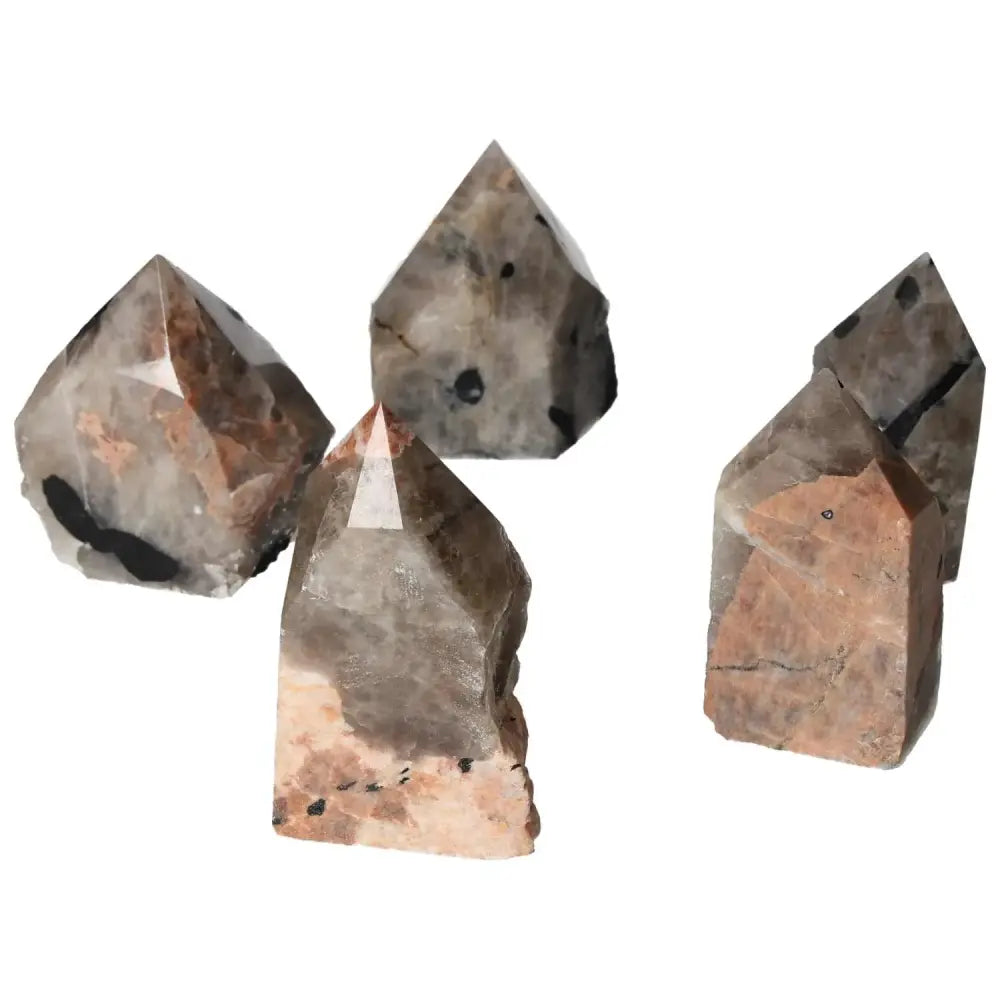 Polished Point Quartz with Tourmaline inclusions, featuring unique patterns, premium Sylvia Crystals gemstone collection.