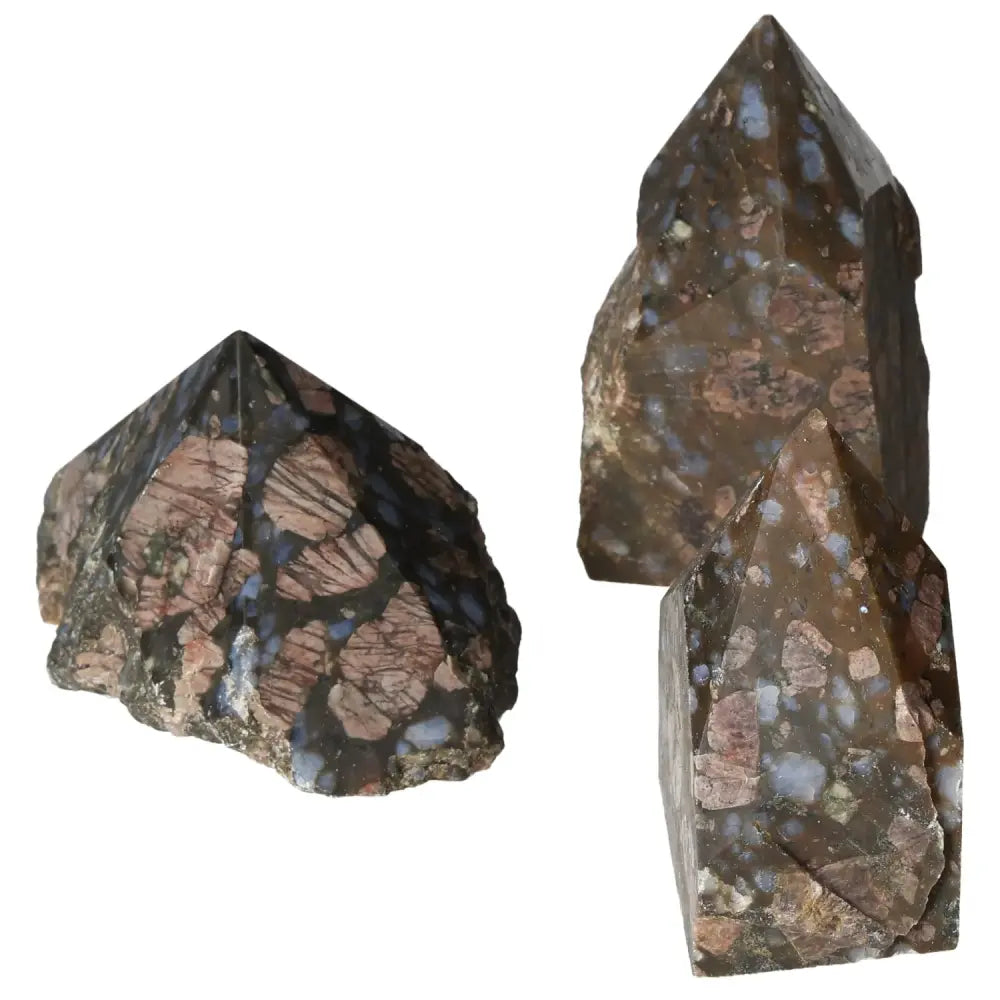 Polished Point Rhyolite L crystals with pink, green, brown, and gray patterns, Sylvia Crystals collection, unique natural design.