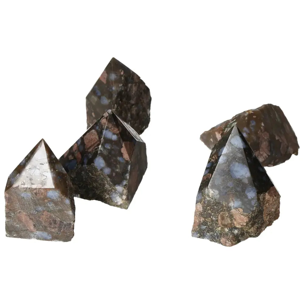 Polished Point Rhyolite S crystals displaying pink, green, brown, and gray hues, showcasing natural volcanic igneous rock elegance.