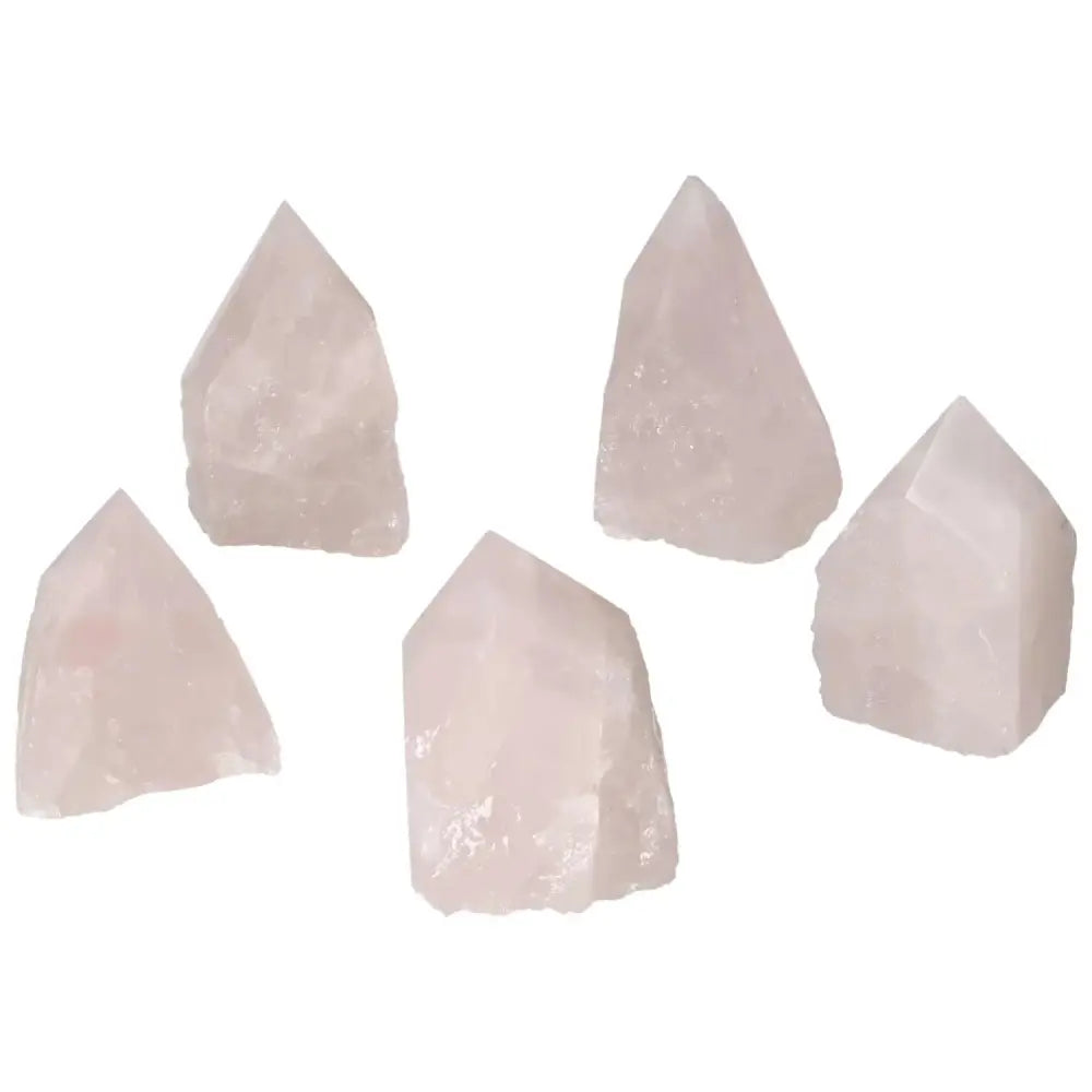 Polished Point Rose Quartz crystals showcasing elegant, handpicked design by Sylvia Crystals for luxury conscious experiences.