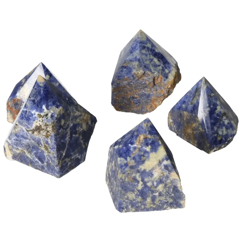 Handpicked polished sodalite points with deep blue hues, enhancing mental clarity and creativity, from Sylvia Crystals.
