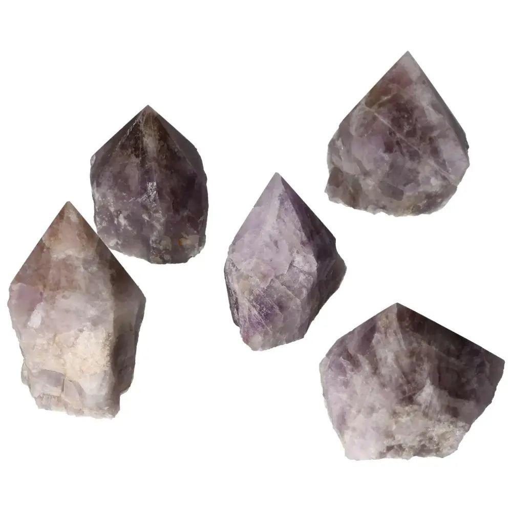 Polished Point Super Seven Amethyst Crystals from Sylvia Crystals, known for stress reduction and energy enhancement.