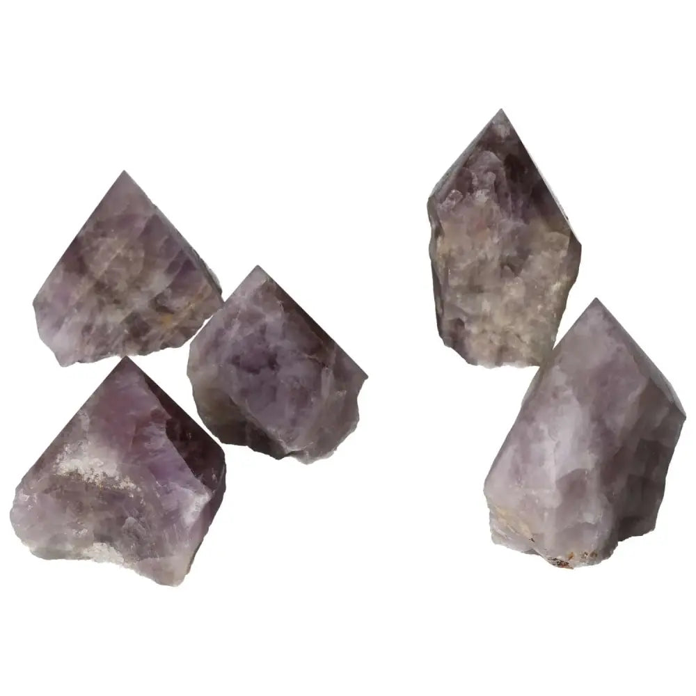 Polished Point Super Seven Amethyst S gemstones from Sylvia Crystals showcasing unique seven-mineral blend and spiritual energy.