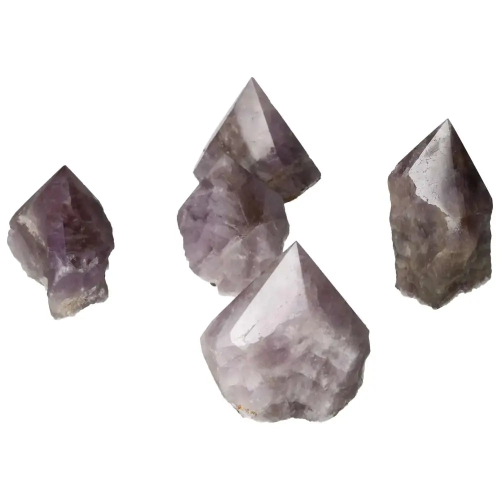 Polished Point Super Seven Amethyst S gemstones, showcasing their enchanting purple hues and precision craftsmanship from Sylvia Crystals.