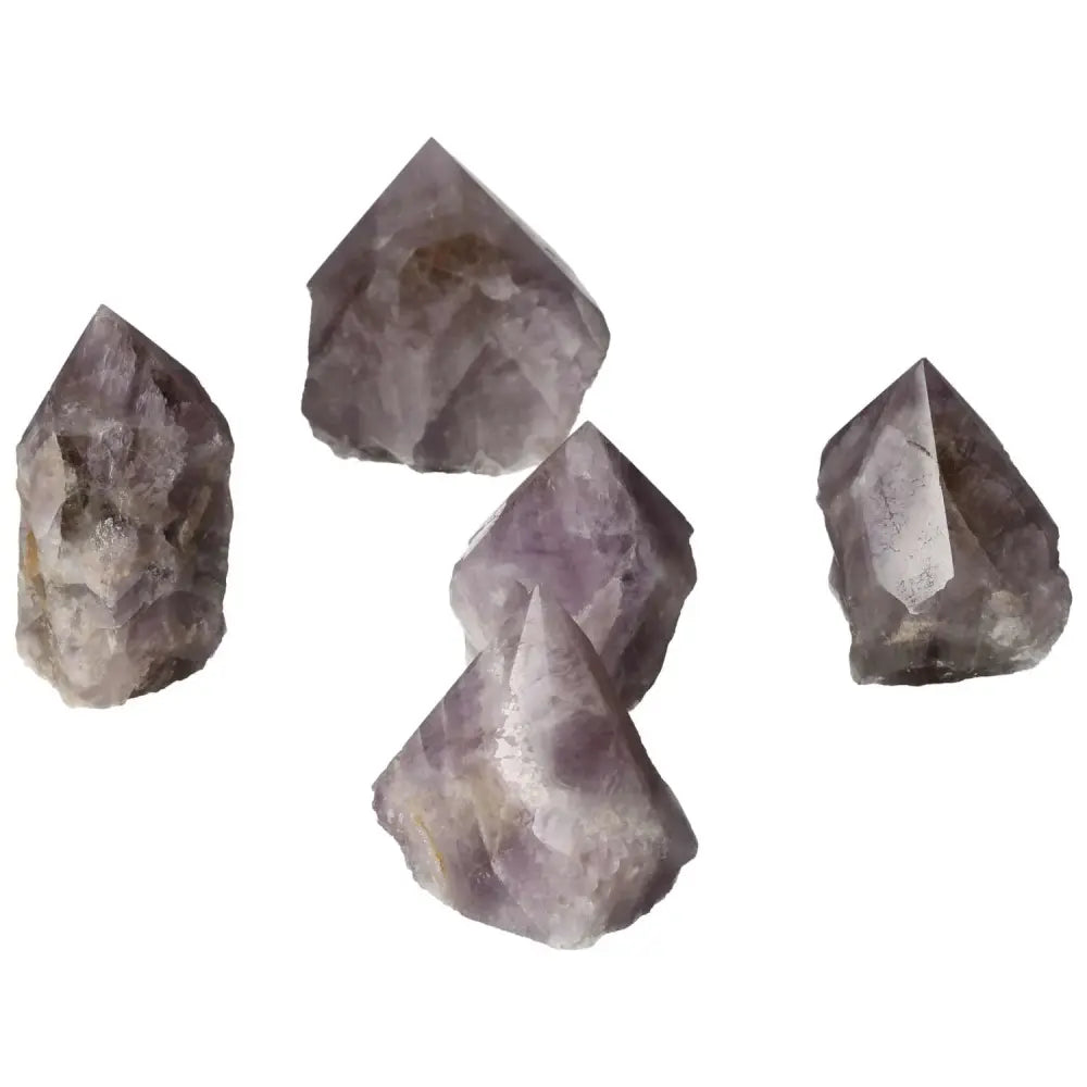 Polished Point Super Seven Amethyst crystals, premium gemstones from Sylvia Crystals, perfect for spiritual growth and emotional balance.