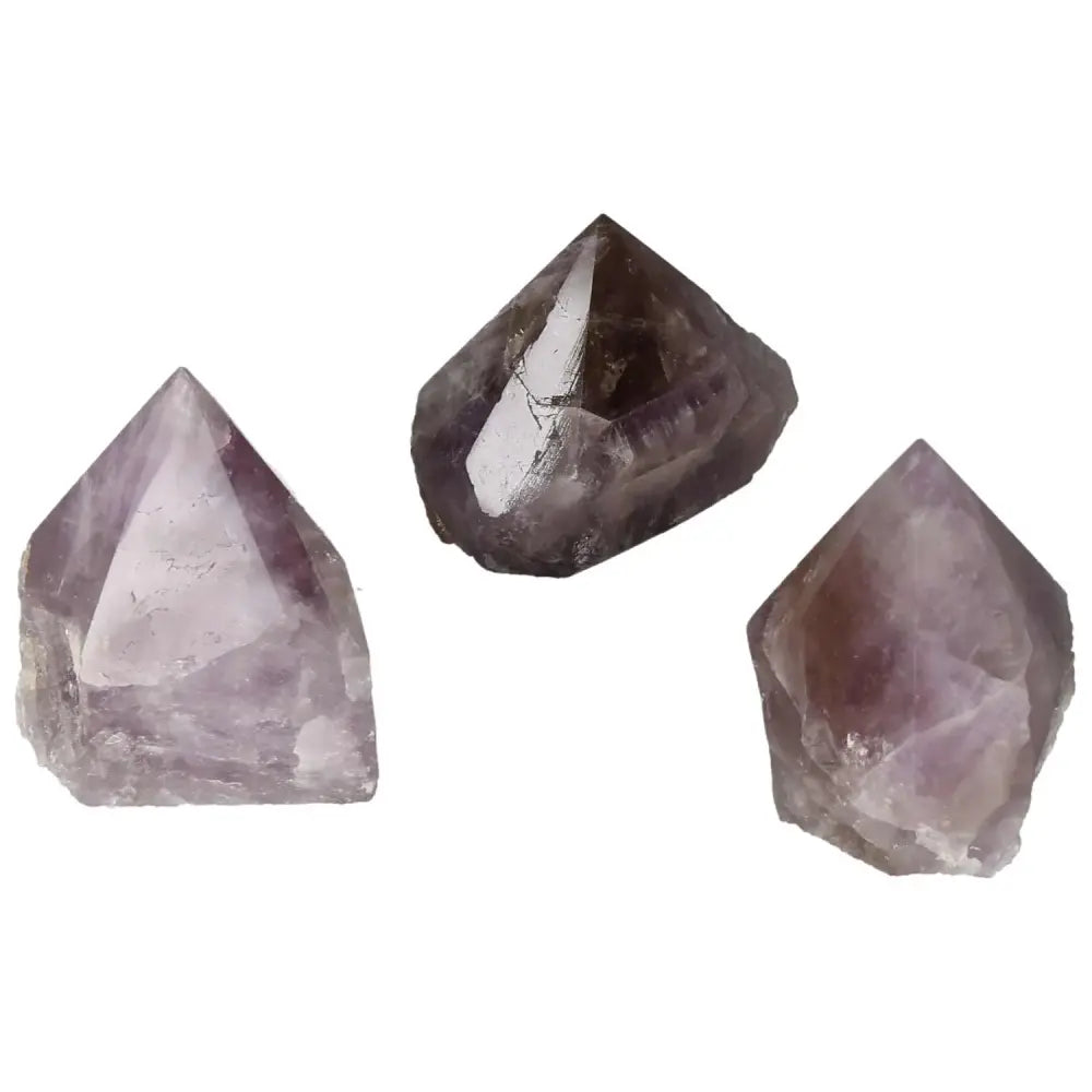 Polished Point Super Seven Amethyst XS gemstones, showcasing unique mineral blend for stress relief and energy boost from Sylvia Crystals.