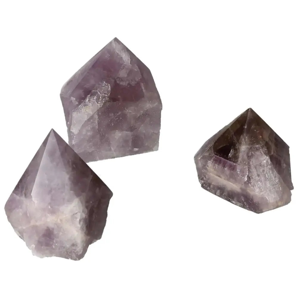 Polished Point Super Seven Amethyst XS gemstones featuring unique mineral blend, enhancing natural healing, available at Sylvia Crystals.