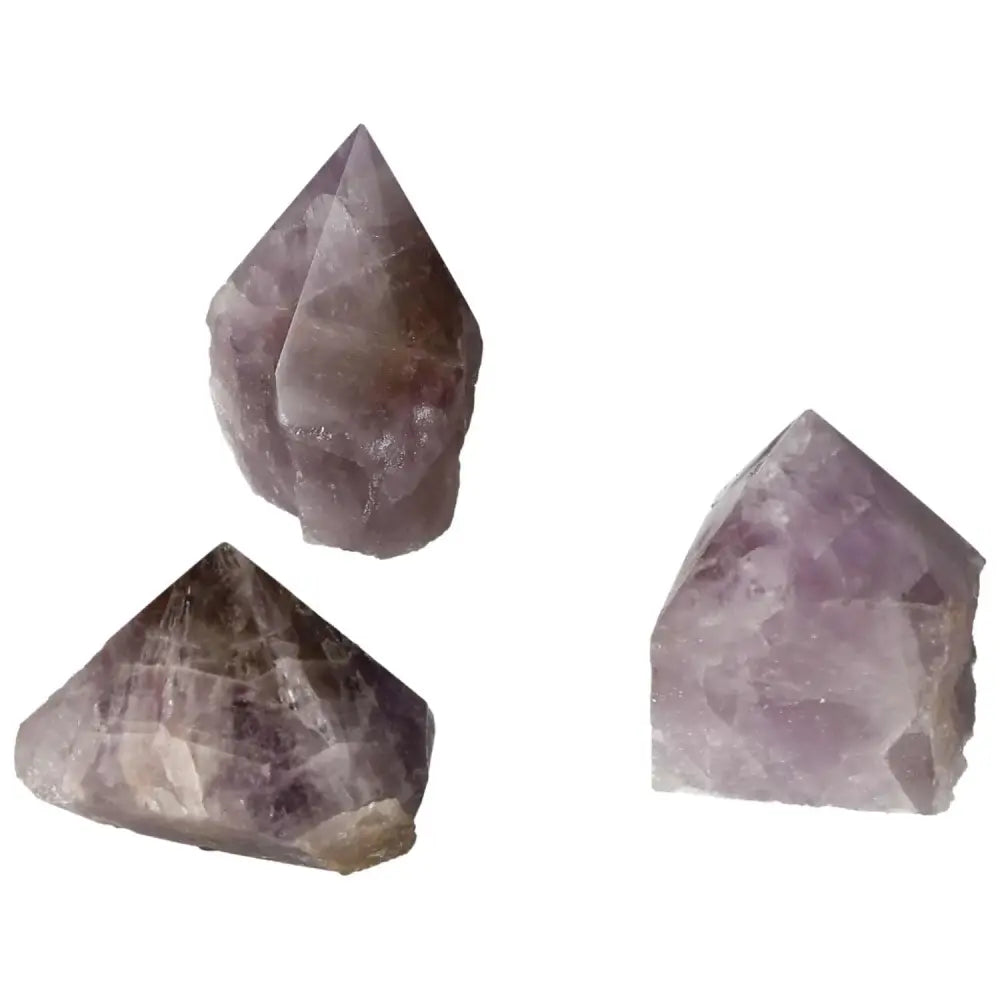 Polished Point Super Seven Amethyst XS gemstones showcasing unique blend of minerals for healing and emotional stability.