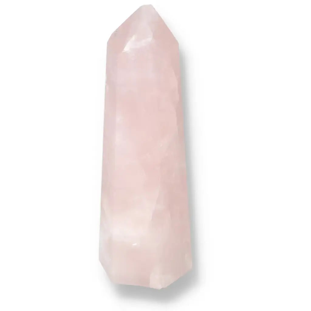 Polished Rose Quartz Obelisk from Sylvia Crystals, featuring elegant pink hues and modern design. Unique, spiritual luxury decor.