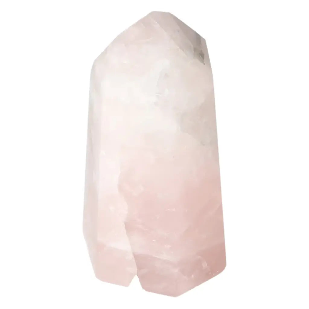 Polished Rose Quartz Obelisk from Sylvia Crystals, symbolizing luxury and elegance, perfect for home decor and spiritual connection.