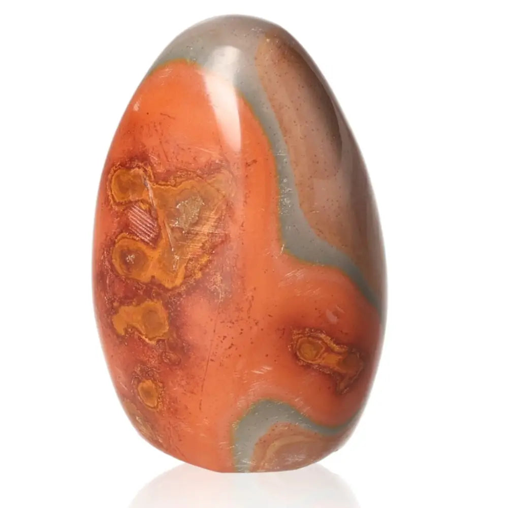 Polychrome Jasper Free Form stone with vibrant red, orange, and yellow patterns, known for its beauty and spiritual harmony.