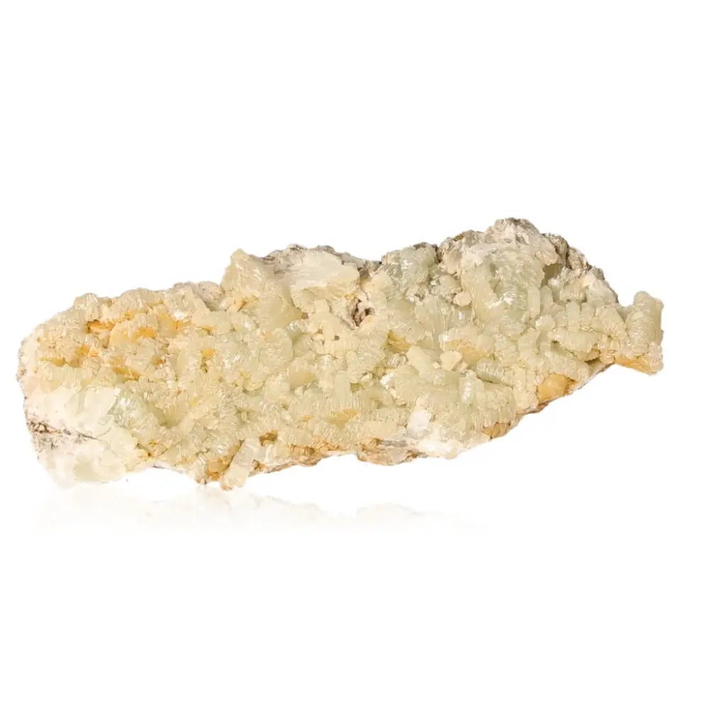 Prehnite Druze gemstone in pale green, known for its calming properties and spiritual growth enhancement, on a white background.